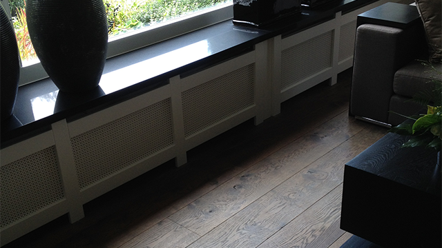 Radiator bekleding in Vierhouten. Jakob van den Berg Witte radiator bekleding in Vierhouten.